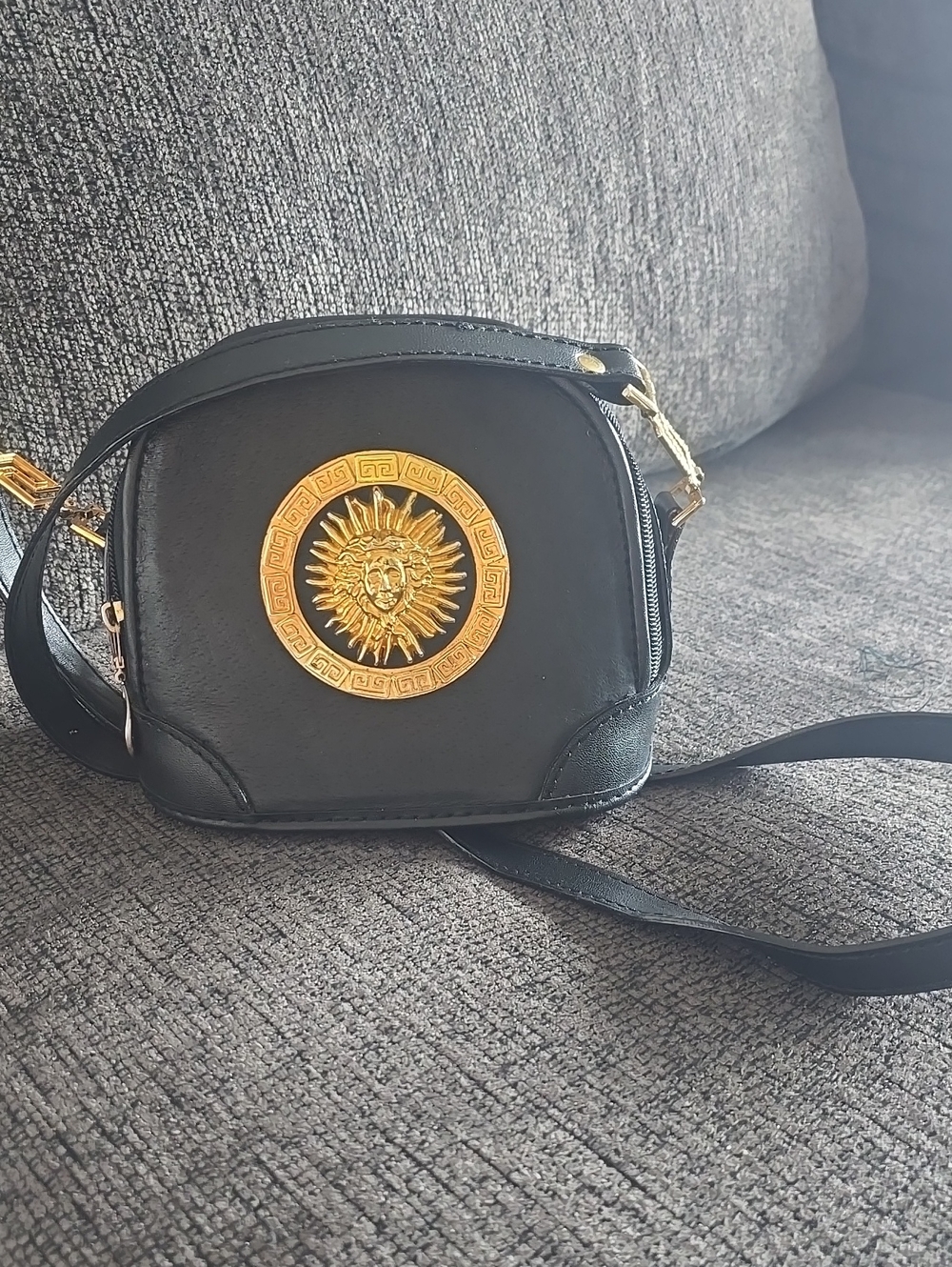 Black Crossbody Bag with Gold Sun Medusa Medallion